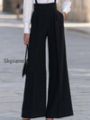black-suspender-wide-leg-trousers-with-white-blouse-set